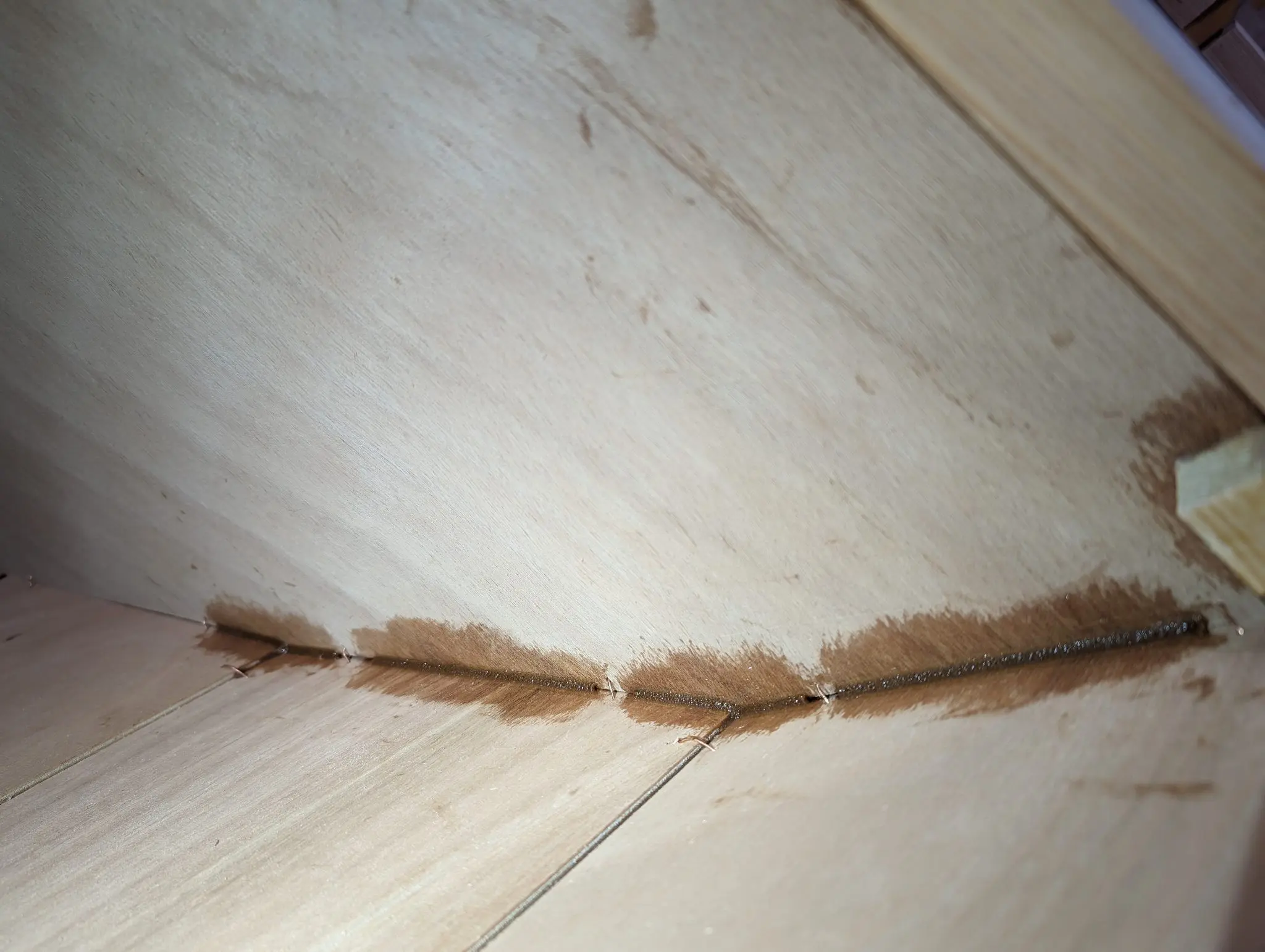 The Guider: Tacking the hull together with epoxy