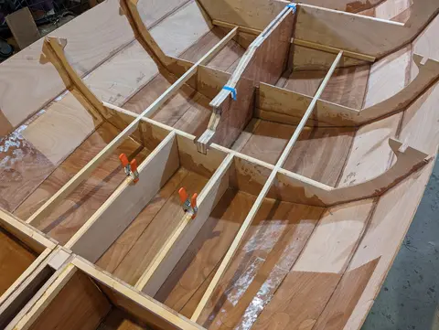 The Guider: Deck cleats and beams installed, dry fitting the deck