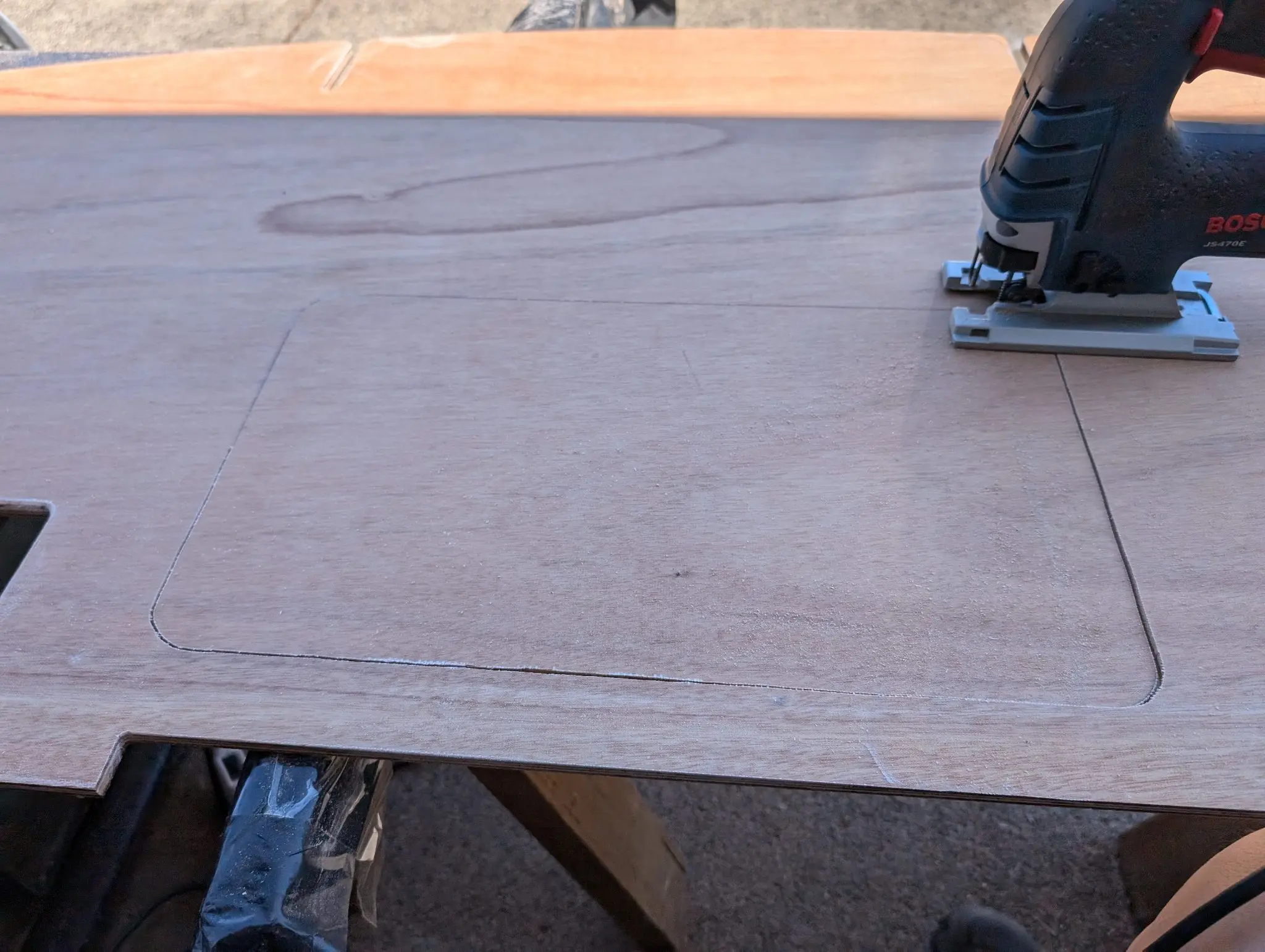 The Guider: Epoxy the cockpit decks, cutting hatches, installing hatch gutters