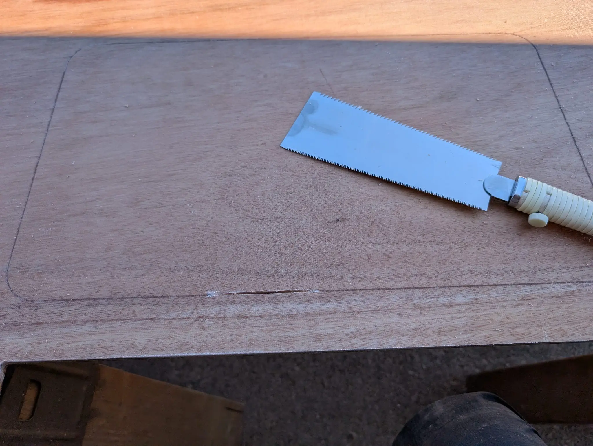 The Guider: Epoxy the cockpit decks, cutting hatches, installing hatch gutters