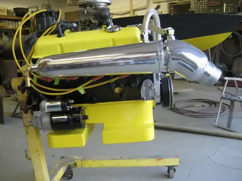 Hot Rod: 283 engine: Over the weekend, we installed the oil pan, remote oil filter relocation kit, dipstick tub