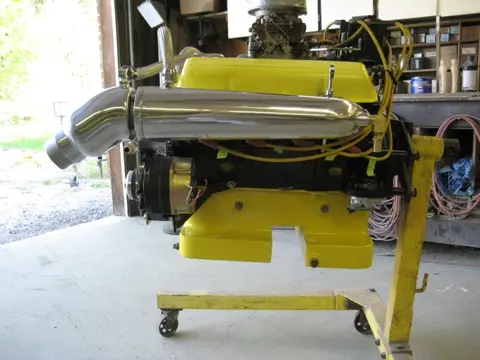 Hot Rod: 283 engine: Over the weekend, we installed the oil pan, remote oil filter relocation kit, dipstick tub