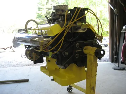 Hot Rod: 283 engine: Over the weekend, we installed the oil pan, remote oil filter relocation kit, dipstick tub
