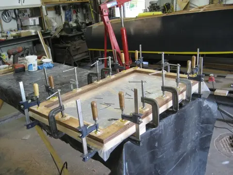 Hot Rod: Seats: 1/4" diameter holes were drilled through the 7 layers of plywood to retain the aluminum se