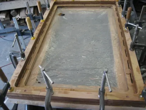 Hot Rod: Seats: At the bottom of the photo, we see the passenger side seat base after routing for webbing