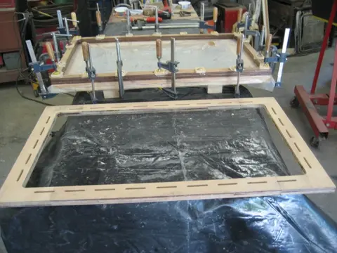 Hot Rod: Seats: At the bottom of the photo, we see the passenger side seat base after routing for webbing