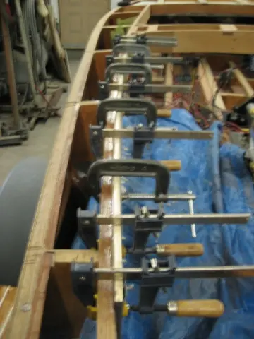 Hot Rod: Carlings and trim: First lamination at Port gunwale clamped