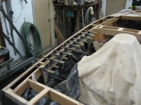 Hot Rod: Carlings and trim: Second lamination at port gunwale clamped