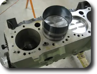 Hot Rod: Chris-Craft 283 rebuild: Installing the piston with a piston ring compressor
