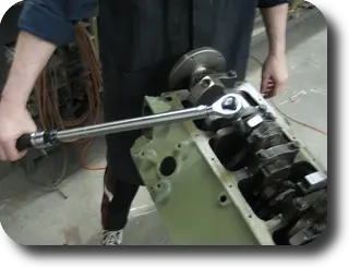 Hot Rod: Chris-Craft 283 rebuild: Installing the piston with a piston ring compressor