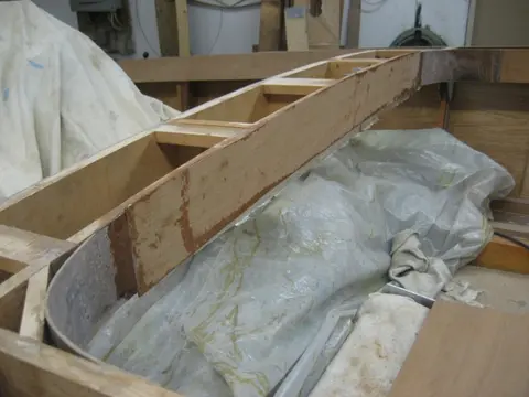 Hot Rod: Carlings and trim: We encapsulated the inside dash surface with one layer of two ounce mat followed up with o