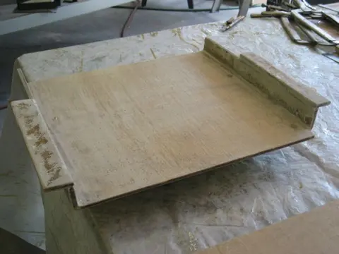 Hot Rod: Jump seats and fuel tank: The fuel tank cradles were built from 1/4" marine grade plywood sandwiched between a layer