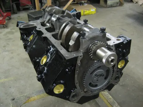 Hot Rod: 355 engine: To check the main bearing oil clearance, we cut a plastigauge strip and placed it on the c