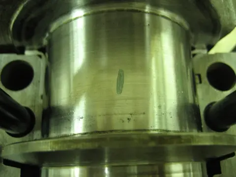 Hot Rod: 355 engine: To check the main bearing oil clearance, we cut a plastigauge strip and placed it on the c