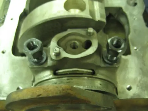Hot Rod: 355 engine: To check the main bearing oil clearance, we cut a plastigauge strip and placed it on the c