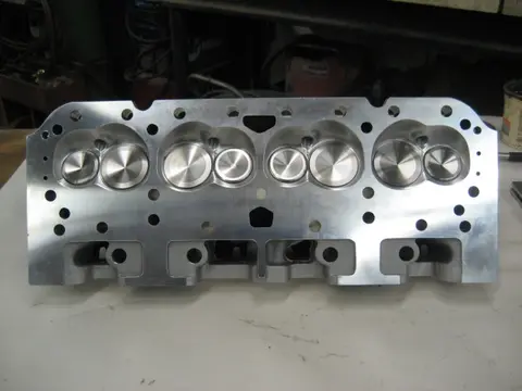 Hot Rod: 355 engine: To check the main bearing oil clearance, we cut a plastigauge strip and placed it on the c