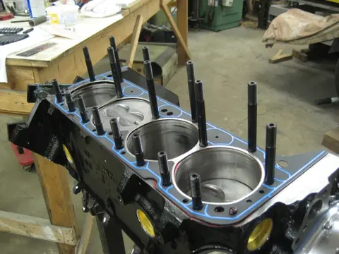 Hot Rod: 355 engine: The stock head bolts were upgraded with an ARP head stud kit