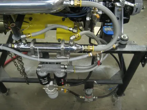 Hot Rod: 355 engine: The bottom portion of our custom built 12 quart oil pan received a coat of truck bed liner