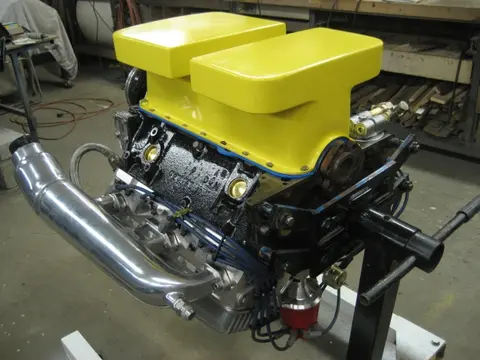 Hot Rod: 355 engine: The bottom portion of our custom built 12 quart oil pan received a coat of truck bed liner