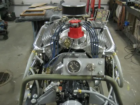 Hot Rod: 355 engine: The bottom portion of our custom built 12 quart oil pan received a coat of truck bed liner