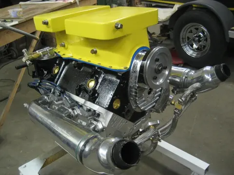 Hot Rod: 355 engine: The bottom portion of our custom built 12 quart oil pan received a coat of truck bed liner