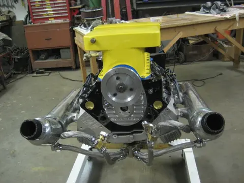 Hot Rod: 355 engine: The bottom portion of our custom built 12 quart oil pan received a coat of truck bed liner