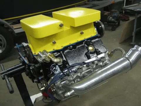 Hot Rod: 355 engine: The bottom portion of our custom built 12 quart oil pan received a coat of truck bed liner