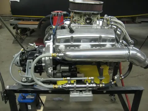 Hot Rod: 355 engine: The bottom portion of our custom built 12 quart oil pan received a coat of truck bed liner