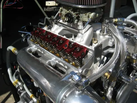 Hot Rod: 355 engine: The bottom portion of our custom built 12 quart oil pan received a coat of truck bed liner