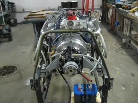 Hot Rod: 355 engine: The bottom portion of our custom built 12 quart oil pan received a coat of truck bed liner