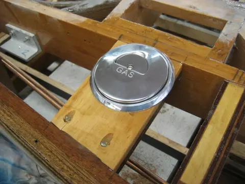 Hot Rod: Jump seats and fuel tank: Fuel fill blocking was laminated from marine grade plywood and Douglas Fir stock