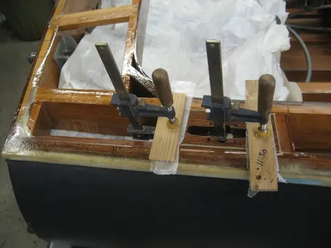 Hot Rod: Deck: Blocking for the aft stainless steel pop-up deck cleats wax glued up