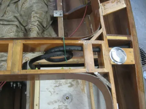 Hot Rod: Jump seats and fuel tank: A 1-1/8" hole saw was used to install the two bilge pump thru-hulls