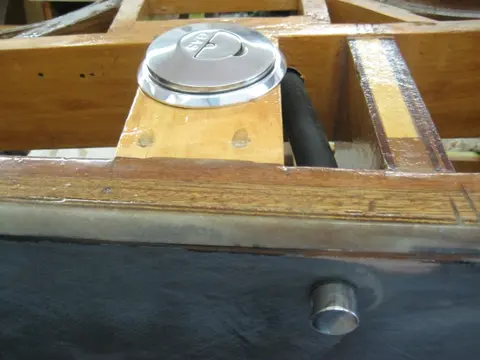 Hot Rod: Jump seats and fuel tank: A 1-1/8" hole saw was used to install the two bilge pump thru-hulls