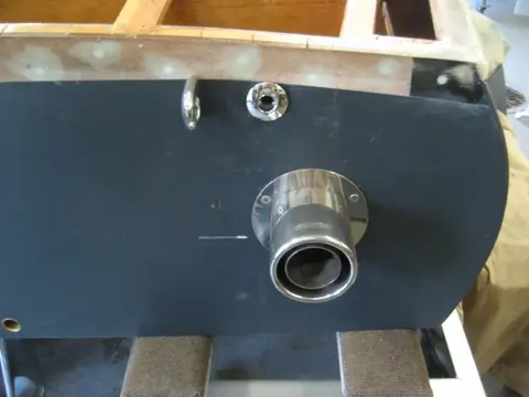 Hot Rod: Jump seats and fuel tank: A 1-1/8" hole saw was used to install the two bilge pump thru-hulls