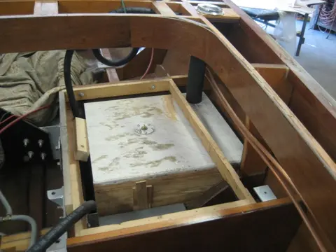Hot Rod: Jump seats and fuel tank: A 1-1/8" hole saw was used to install the two bilge pump thru-hulls