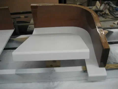 Hot Rod: Jump seats and fuel tank: We built up the jumpseat's leading edge with a piece of 1" x 2" stock and radiused the top