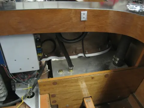 Hot Rod: Jump seats and fuel tank: The 5/8" rubber fuel vent hose has been looped to form a high loop before its routed to th
