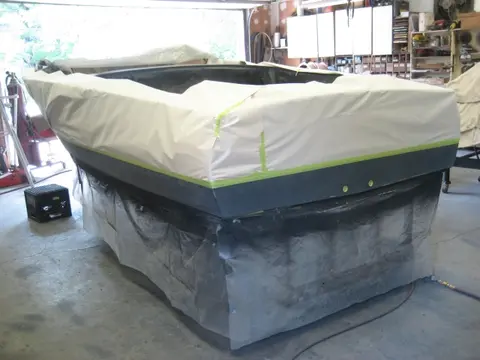 Hot Rod: Deck: A transit level was used to mark a 6" waterline on the hull