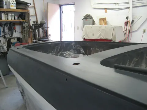 Hot Rod: Deck: A transit level was used to mark a 6" waterline on the hull