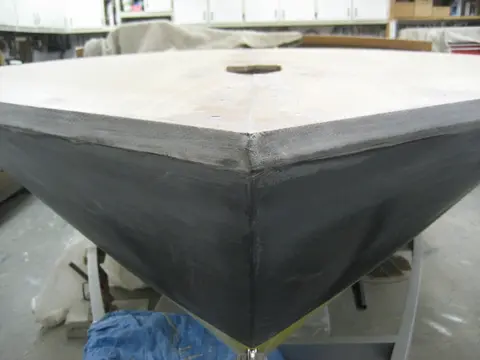 Hot Rod: Deck: Fiberglass was trimmed with a utility knife and blocked with coarse sandpaper
