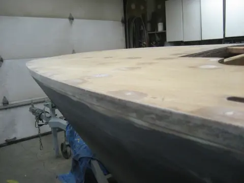 Hot Rod: Deck: Fiberglass was trimmed with a utility knife and blocked with coarse sandpaper