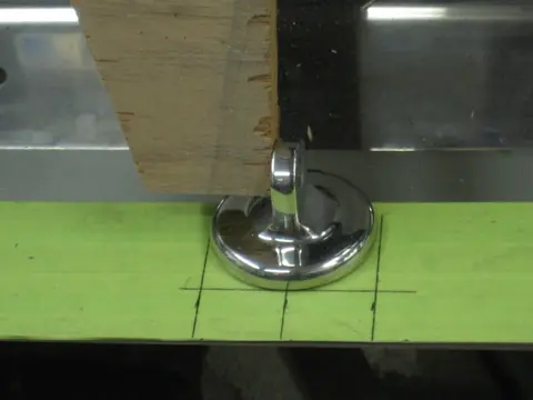 Hot Rod: Cavitation plates: We fabricated an alignment jig made from 3/4" plywood scraps and hose clamps to mark locat