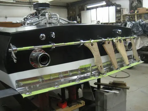 Hot Rod: Cavitation plates: We fabricated an alignment jig made from 3/4" plywood scraps and hose clamps to mark locat
