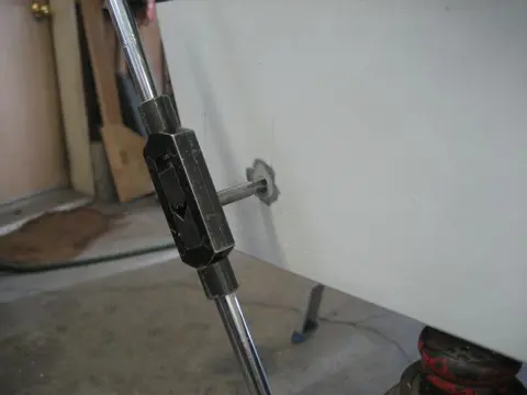 Hot Rod: Cavitation plates: A 9/32" pilot hole was bored followed by a 5/16" tap to thread the bolt hole