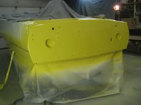 Hot Rod: Cavitation plates: An hour later, we topcoated the white base coat with single stage Sherwin Williams Genesis