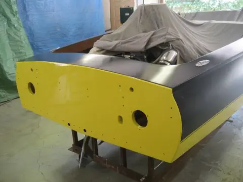 Hot Rod: Cavitation plates: An hour later, we topcoated the white base coat with single stage Sherwin Williams Genesis