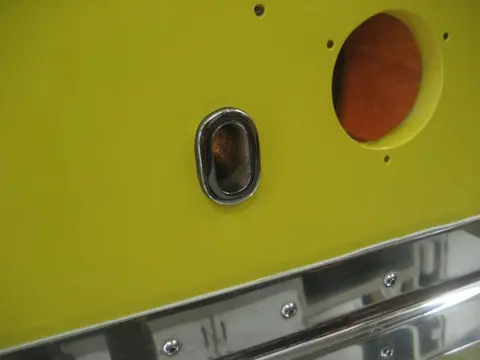 Hot Rod: Cavitation plates: Opening for the thru hull fitting is to the left of exhaust pipe hole
