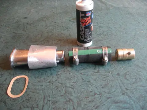 Hot Rod: Cavitation plates: Opening for the thru hull fitting is to the left of exhaust pipe hole