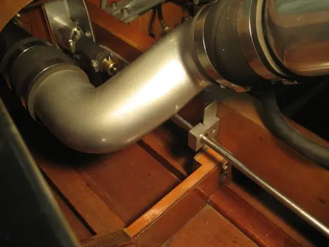 Hot Rod: Cavitation plates: It's a very tight fit, but there's just enough room for the thru hull fitting and cavitati
